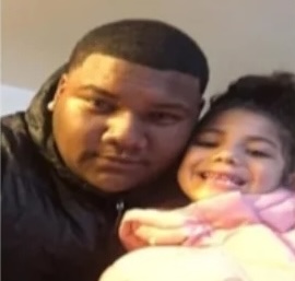 Photo of Da'Jon Kee posing for a selfie with his daughter