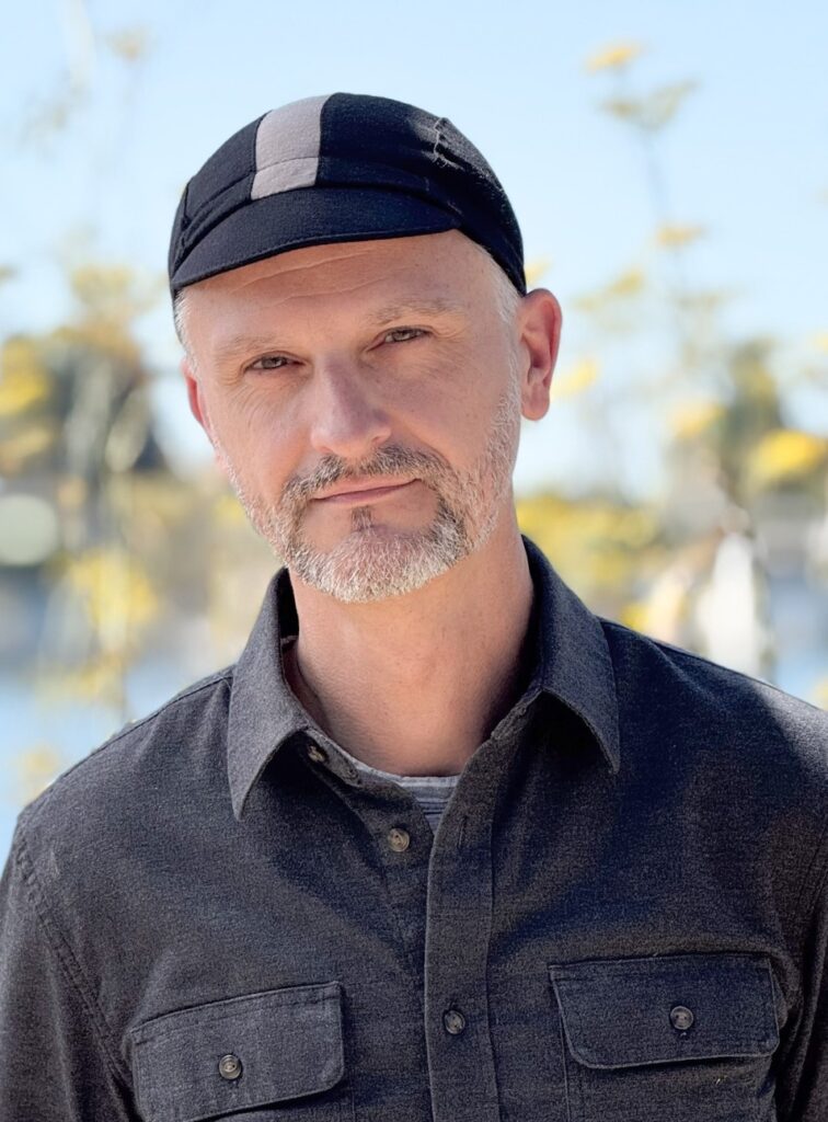 A close-up portrait of Bike East Bay staff member
